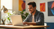 © Evans - Happy Hispanic man working remotely from home office, smiling while using laptop for online business or e-learning. Freelancer, student, entrepreneur, technology, modern lifestyle.