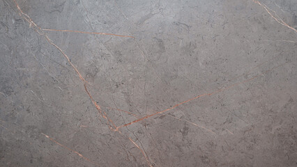 Fototapete - grey stone with a red line running through it. The stone is rough and has a rustic feel to it