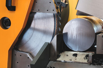 Aufkleber - Modern automatic circular saw cutting large metal part with round cross-section, industrial concept background