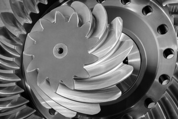 Poster - Close-up of a gear with a hole in the center. gear is made of metal and has a round shape, industrial concept background