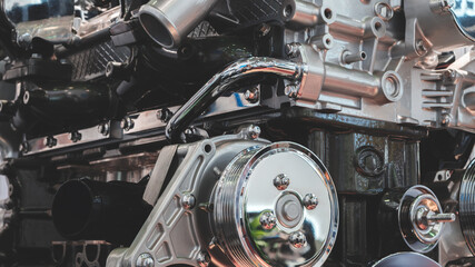 Aufkleber - close up of a car engine with a lot of detail. The engine is a complex piece of machinery with many parts and components. Concept of awe and admiration for the engineering and design of the engine