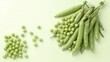 © MaeOnline - Freshly harvested pea pods and loose peas displayed on a pale green surface showcasing healthy eating