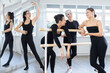 © JackF - Ballerinas communicate with each other during a break between classes in a choreographic studio
