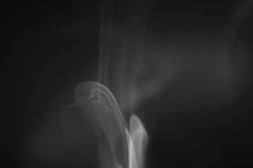 Wall Mural - macro shot of smoke vapour particles release in the air
