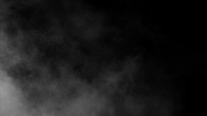 Wall Mural - realistic white fog or smoke plume billows from left side spreading across a black screen. ideal for