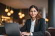 © Selvi - Woman working laptop in professional attire