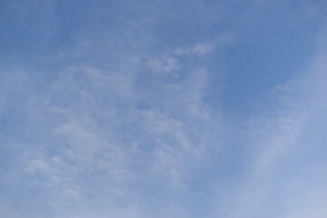 Wall Mural - beautiful blue sky and white cloud background in springtime