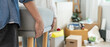 © Shisu_ka - Moving house, relocation. Couple help set sofa and move furniture for new apartment, inside the room was a cardboard box contain personal belongings. move in the new apartment or condominium