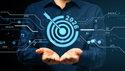 Poster - Businessman holding digital target icon with 2026 goal symbol, futuristic tech background and light circuits representing future strategy planning.