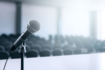 Poster - Closeup of microphone on stand in empty conference room with blurred background, soft lighting and indoor setting, ready for presentation scene. 3D Rendering