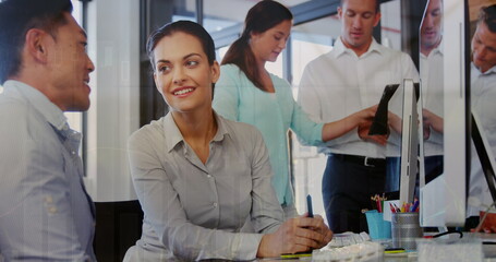 Poster - Image of graphs over diverse businesspeople working in office