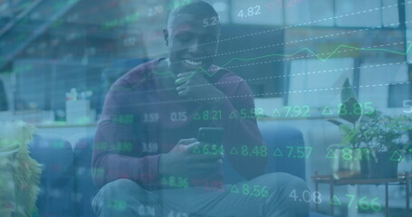 Poster - Image of financial data processing over african american businessman using smartphone