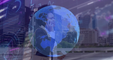 Poster - Image of globe and data processing over african american businesswoman talking on smartphone