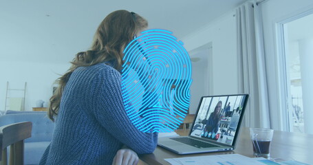 Poster - Image of biometric fingerprint scanner over caucasian having a imagecall on laptop at home