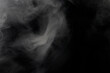 © akn - Abstract Smoke Wisps Against a Dark Background