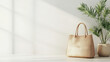 © Suppachon - Beige Woven Tote Bag with Palm Plant on White Wooden Surface, Bright Sunlight