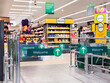 © Austockphoto - welcome signs at the entrance of of a supermarket