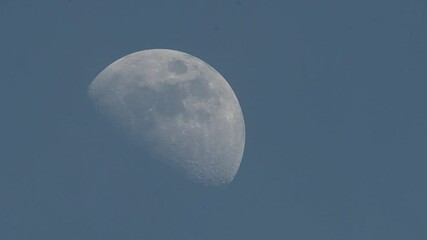 Wall Mural - Moon and clouds. Crescent moon between clouds. Full moon in the sky