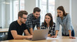 © Item.io - Young creative team brainstorming project ideas laptop teamwork success