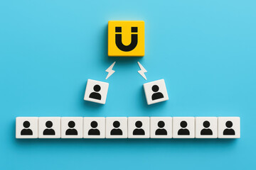 Poster - This conceptual represents attraction and influence in business relationships illustrating how key connections draw individual participants toward a central force on a bright blue background