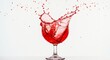 © Cleverson - Red liquid splashes out of clear stemware on a bright white background, capturing a dynamic moment.