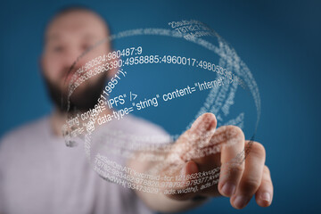 Aufkleber - A man interacts with a digital sphere showing lines of code, representing internet technology and programming.