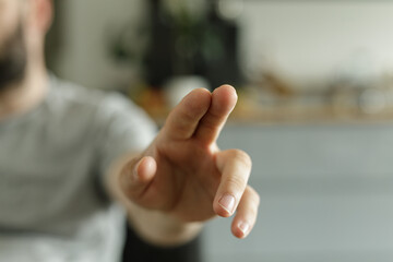 Poster - Close-up of a man's hand reaching out.  Perfect for concepts of connection, help, and interaction.