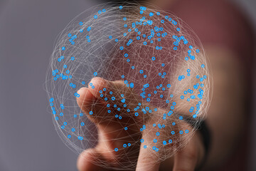 Poster - Abstract image of a hand interacting with a digital sphere representing global network connections.