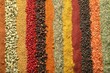 © New Africa - Many different spices as background, top view