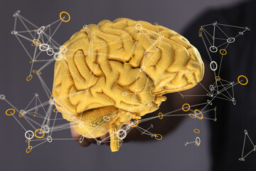Aufkleber - Abstract image of a golden brain with connecting lines, representing neural networks and intelligence.