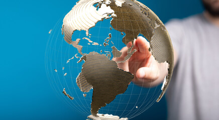 Fototapete - Person interacts with a digital globe, representing global connection and networking.
