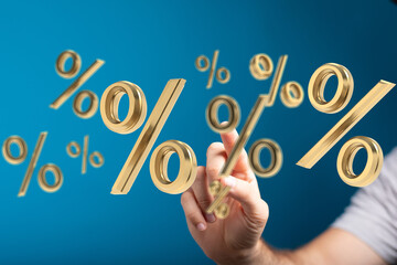 Poster - Hand interacting with 3D golden percentage symbols. Perfect for sales, finance, and marketing.