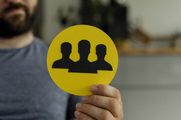 Aufkleber - Image of a person holding a symbol representing teamwork and collaboration.