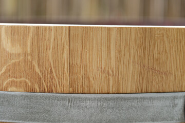 Poster - High-resolution image of light oak wood grain texture above a gray concrete base. Ideal for backgrounds and design projects.