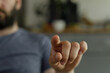 © vegefox.com - Close-up of a man's hand pointing at a screen.  Perfect for technology, innovation, and interaction concepts.