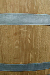 Poster - High-resolution image of a rustic wooden barrel with metal bands. Perfect for backgrounds or textures.