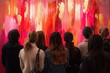 © Milaballe - Group of women admiring vibrant pink and gold abstract art installation at contemporary gallery