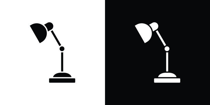 Desk lamp icon in flat version on black and white background