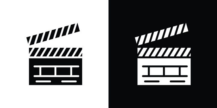 Film clapperboard icon in flat version on black and white background