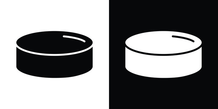 Hockey puck icon in flat version on black and white background