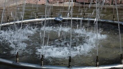 Aufkleber - A close-up shot of a fountain with water flowing out