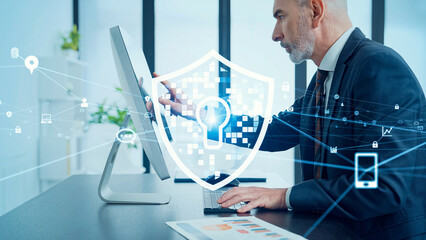 Poster - Cyber ​​security concept visual with a middle-aged Caucasian man working in an office