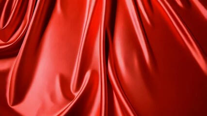 Poster - Elegant flowing folds of vibrant red satin fabric catching light and creating luxurious textures and dramatic visual appeal