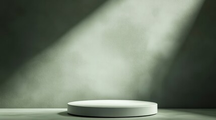 Wall Mural - minimalist white round pedestal in spotlight against a dark green wall.