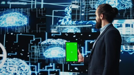 Poster - Studying neural networks systems, young IT specialist implements artificial intelligence with mockup screen on tablet. Man using automation for modern AI strategy and innovation. Camera B.