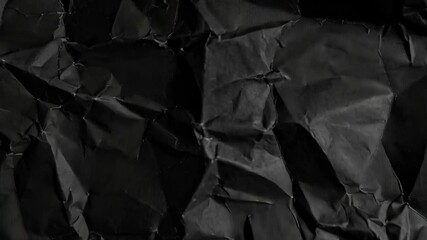 Poster - Abstract dark crumpled paper texture displaying a high contrast surface pattern and rough, distressed aesthetic, ideal for backgrounds.