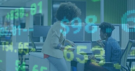 Poster - Two coworkers pointing at laptop screen after market data fading in, handing document for analysis