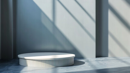 Poster - A round white podium stands in a minimalist room with sunlight casting shadows on the wall