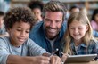 © hakule - A man is sitting with two children and looking at a tablet