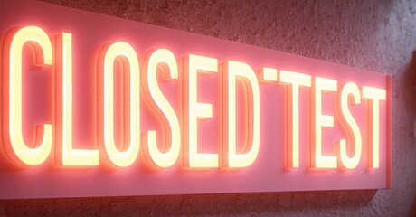 Aufkleber - Bright neon sign displays CLOSED then TEST. Red glow illuminates textured wall. Simple, direct messaging.